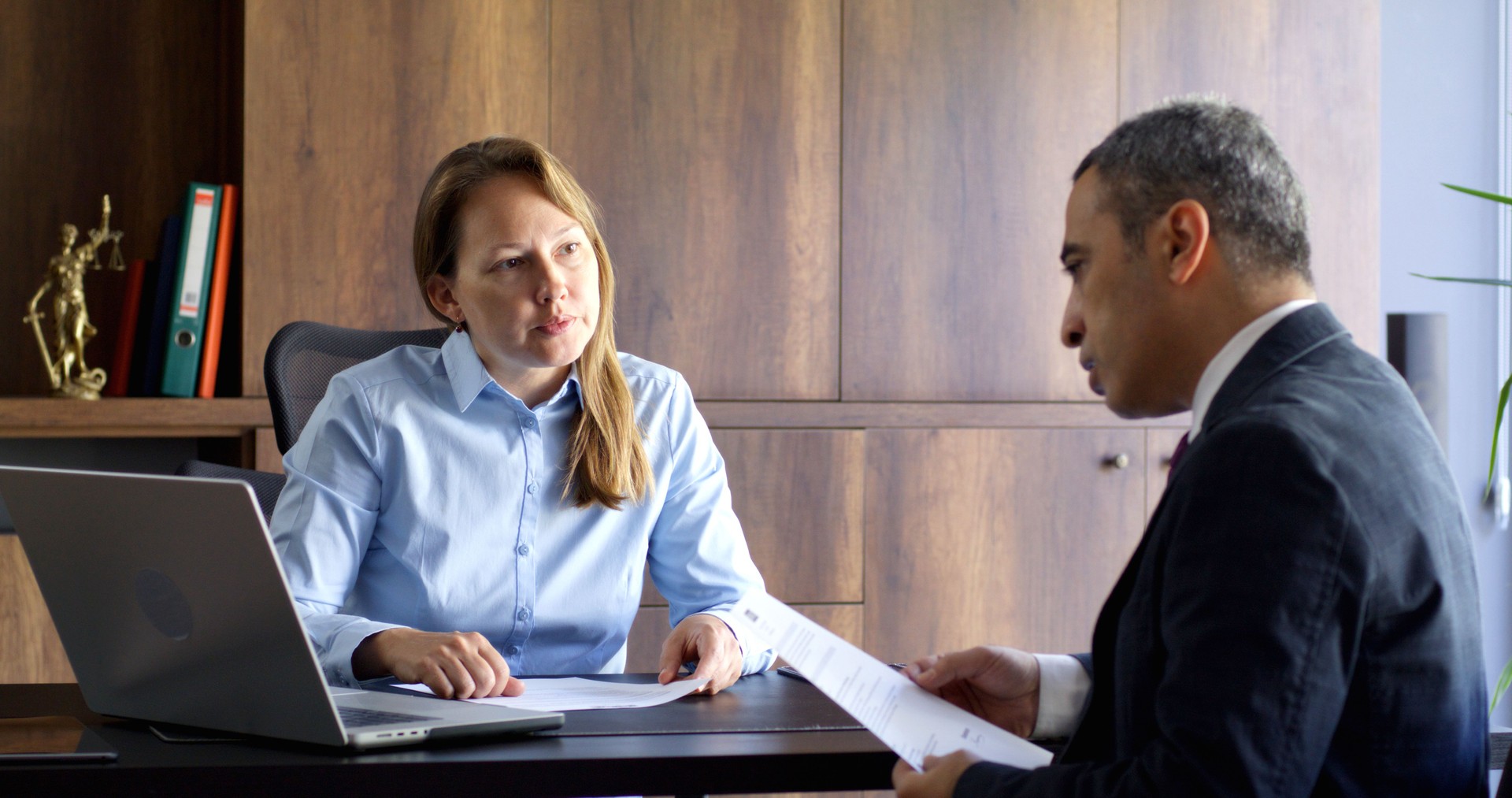 Lawyer And Business Person Discussing About Contract In The Office Meeting Room